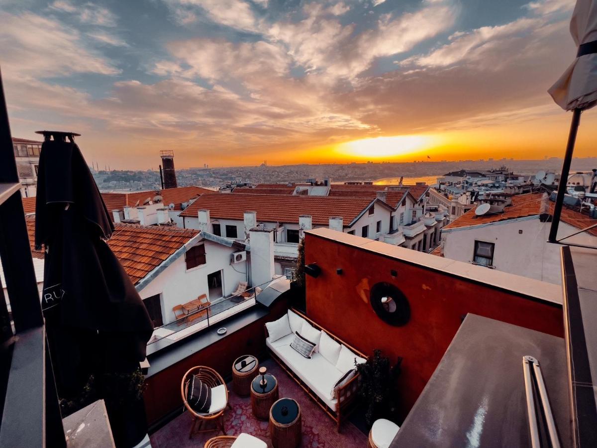 Ruz Hotels Istambul Exterior foto Sunset over the rooftops of the city